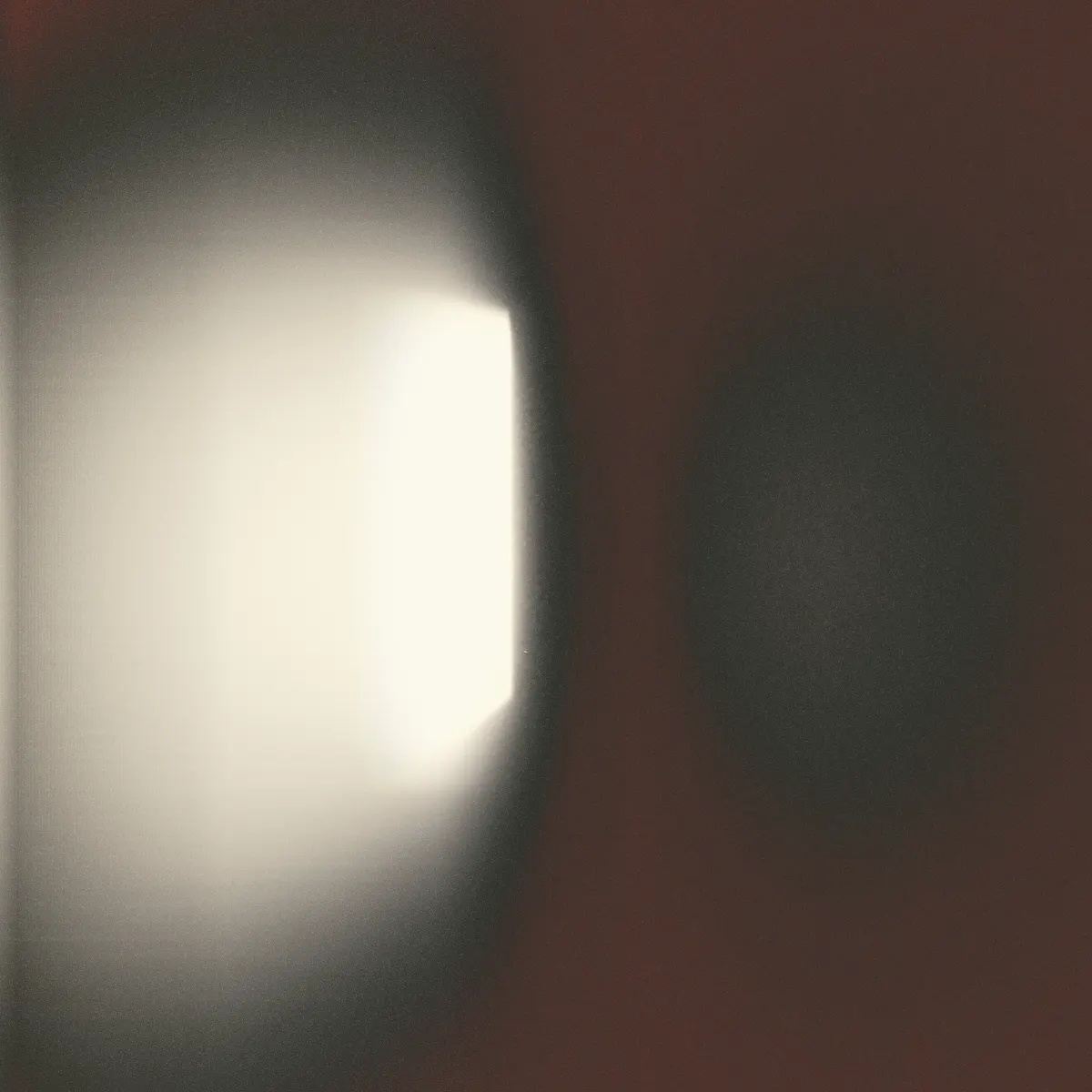 Window light falling across an interview room